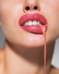 Woman-Pulling-Bubblegum-From-Mouth