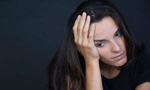 Numbing-pain-depressed-woman